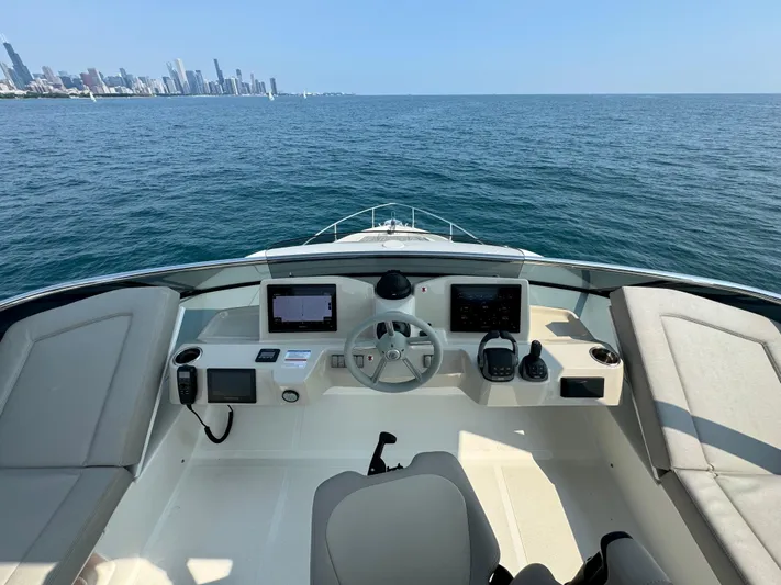 Just You Yacht Photos Pics Cockpit view of 2023 Absolute 52 Navetta yacht on open water.