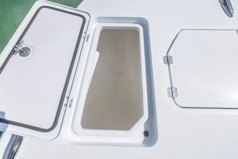  Yacht Photos Pics Open storage compartment on 2026 Invincible 33 Catamaran deck.