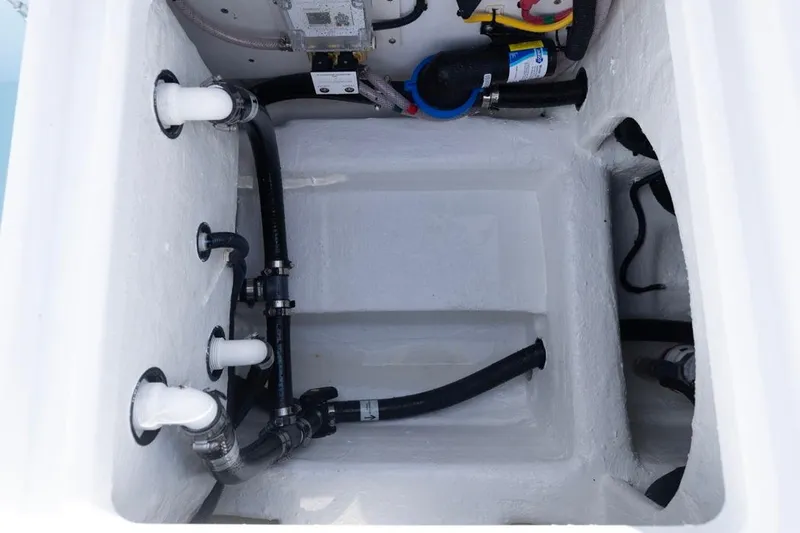  Yacht Photos Pics Bilge area of 2026 Invincible 33 Catamaran with visible plumbing and wiring.