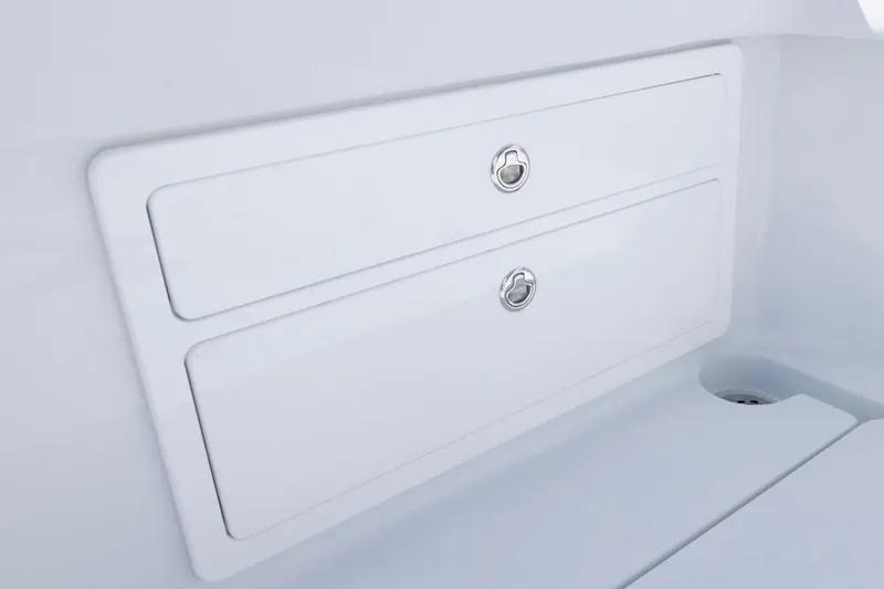  Yacht Photos Pics Storage compartments on 2026 Invincible 33 Catamaran, featuring sleek white design and secure latches.