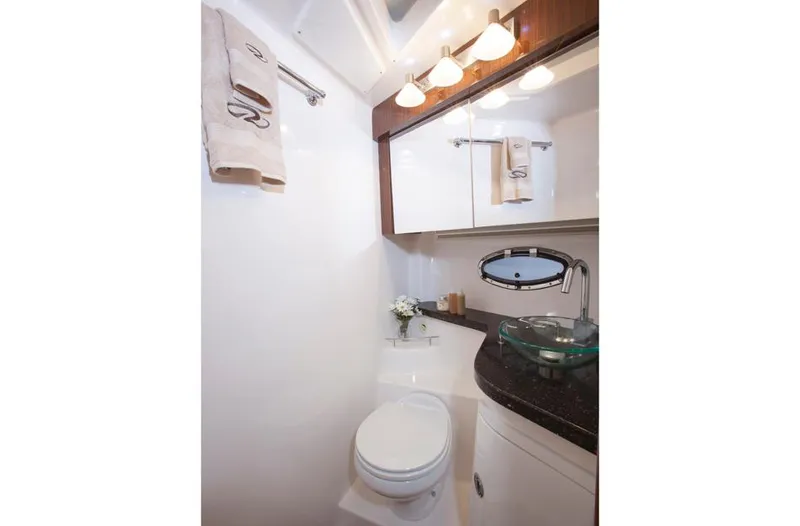  Yacht Photos Pics Manufacturer Provided Image: 2015 Regal 42 Sport Coupe bathroom with modern fixtures and elegant design.