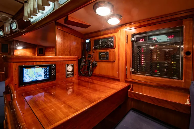 Hera Yacht Photos Pics Navigation station of 1994 Hinckley Sou'wester 42 Sloop with control panels and equipment.