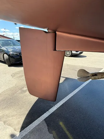 Windquest Yacht Photos Pics 2001 Catalina 42 MkII rudder and propeller in a parking lot.