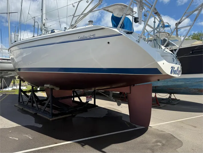 Windquest Yacht Photos Pics 2001 Catalina 42 MkII sailboat on dry dock, showcasing hull and keel.