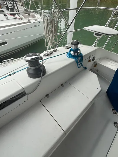 Windquest Yacht Photos Pics 2001 Catalina 42 MkII sailboat deck with winches and ropes, docked near water.