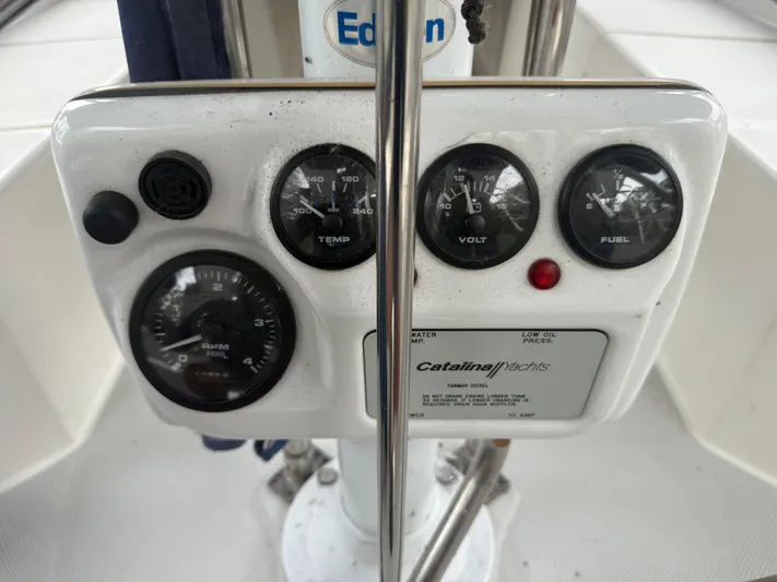 Windquest Yacht Photos Pics Control panel of a 2001 Catalina 42 MkII sailboat with gauges and indicators.