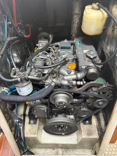 Windquest Yacht Photos Pics Engine compartment of a 2001 Catalina 42 MkII sailboat, showcasing detailed mechanical components.