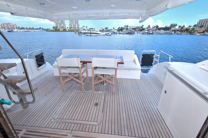 Wanderlust Yacht Photos Pics Luxury yacht deck with seating area, overlooking marina. Dyna 60, 2015 model.