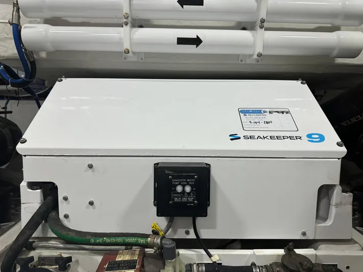 The 7 C's Yacht Photos Pics Seakeeper 9 stabilizer in 2021 Cruisers Yachts 60 Cantius Flybridge engine room.