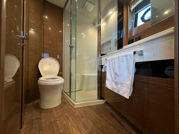 The 7 C's Yacht Photos Pics Luxurious bathroom in 2021 Cruisers Yachts 60 Cantius Flybridge with modern amenities.