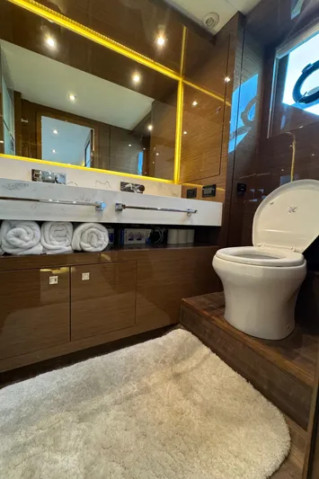 The 7 C's Yacht Photos Pics Luxurious bathroom in 2021 Cruisers Yachts 60 Cantius Flybridge, featuring modern fixtures and elegant design.