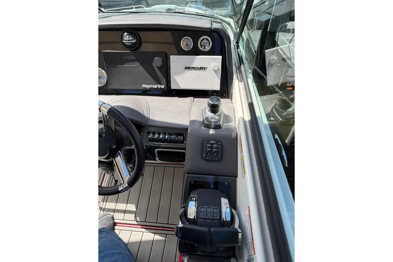  Yacht Photos Pics 2020 Formula 330 Crossover Bowrider OB dashboard with steering wheel and control panel.