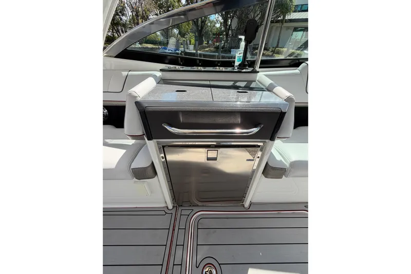  Yacht Photos Pics 2020 Formula 330 Crossover Bowrider OB interior with sleek countertop and seating.