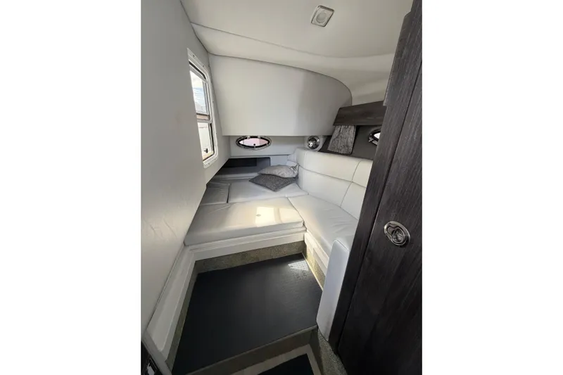  Yacht Photos Pics 2020 Formula 330 Crossover Bowrider OB cabin interior with white seating and modern design.