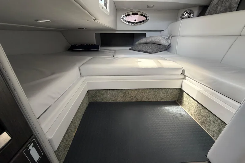  Yacht Photos Pics Interior cabin of 2020 Formula 330 Crossover Bowrider OB with cushioned seating.