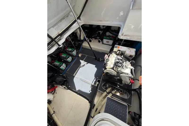 Yacht Photos Pics Engine compartment of 2020 Formula 330 Crossover Bowrider OB, showcasing mechanical components.