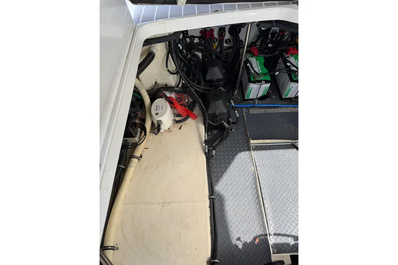  Yacht Photos Pics Engine compartment of a 2020 Formula 330 Crossover Bowrider OB with batteries and wiring.