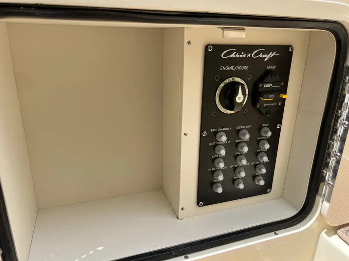  Yacht Photos Pics Control panel of 2024 Chris-Craft Launch 25 GT boat, featuring engine and house switches.