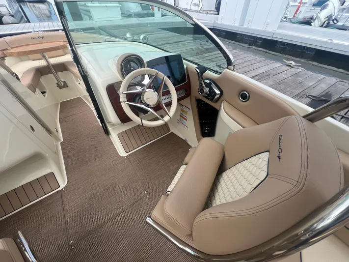  Yacht Photos Pics 2024 Chris-Craft Launch 25 GT interior with luxurious seating and modern dashboard.