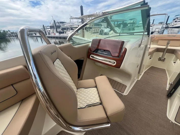  Yacht Photos Pics 2024 Chris-Craft Launch 25 GT interior with luxurious seating and elegant dashboard.