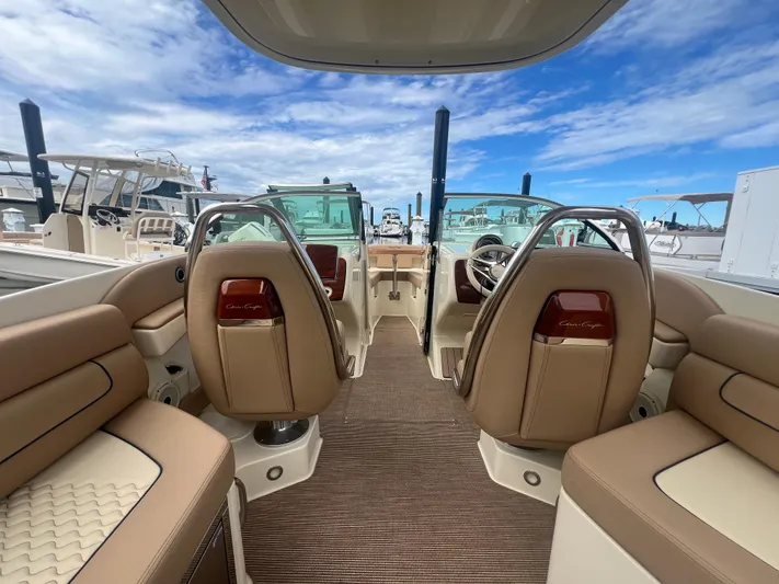  Yacht Photos Pics 2024 Chris-Craft Launch 25 GT interior with luxurious seating and elegant design.