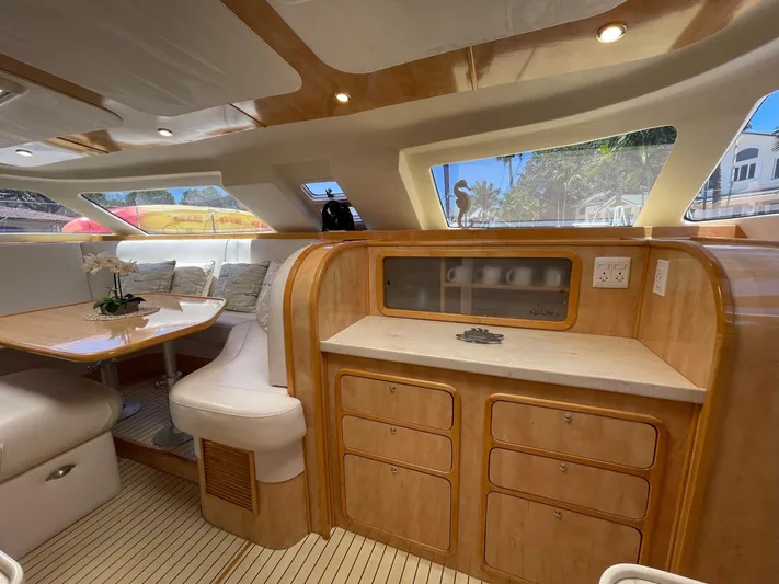  Yacht Photos Pics Interior of a 2016 Knysna 500 SE yacht with wooden furnishings.