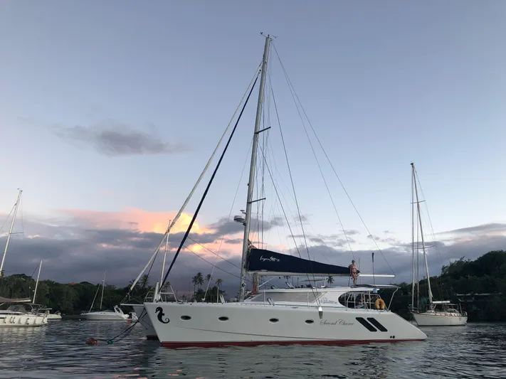  Yacht Photos Pics 2016 Knysna 500 SE catamaran at sunset on calm waters.