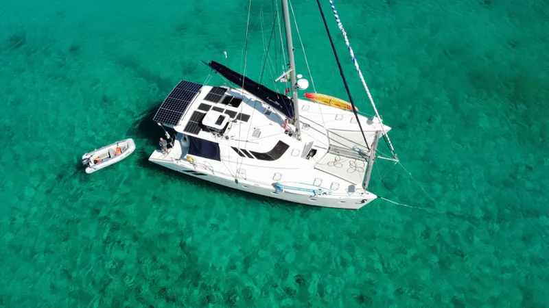  Yacht Photos Pics Aerial view of a 2016 Knysna 500 SE yacht in clear waters.