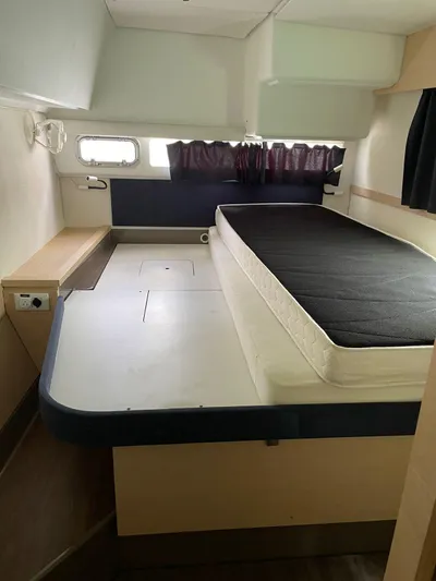 Seatitudes Yacht Photos Pics Cabin interior of 2017 Fountaine Pajot Helia 44 Evolution catamaran with bed and window.