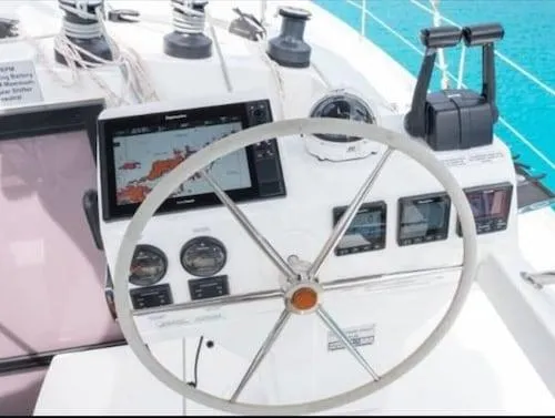 Seatitudes Yacht Photos Pics Helm of 2017 Fountaine Pajot Helia 44 Evolution catamaran with navigation instruments.