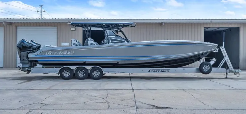  Yacht Photos Pics 2023 Nor-Tech 390 Sport Center Console boat on trailer, side view.