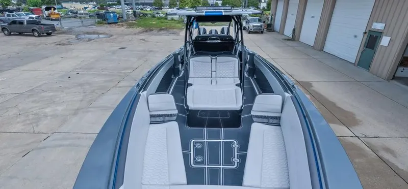  Yacht Photos Pics 2023 Nor-Tech 390 Sport Center Console boat with spacious seating and sleek design.