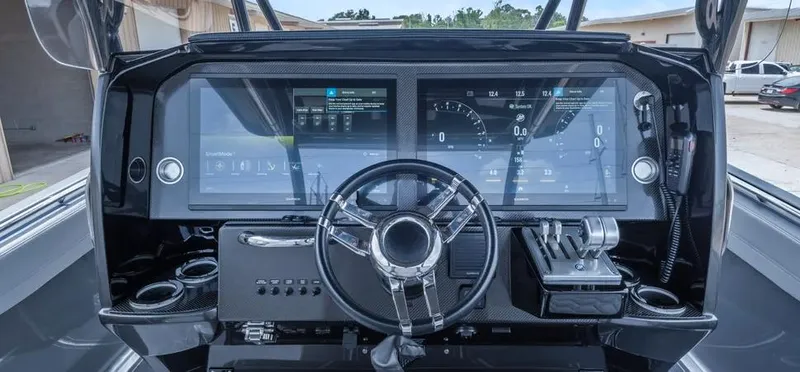  Yacht Photos Pics 2023 Nor-Tech 390 Sport Center Console dashboard with advanced controls and digital displays.