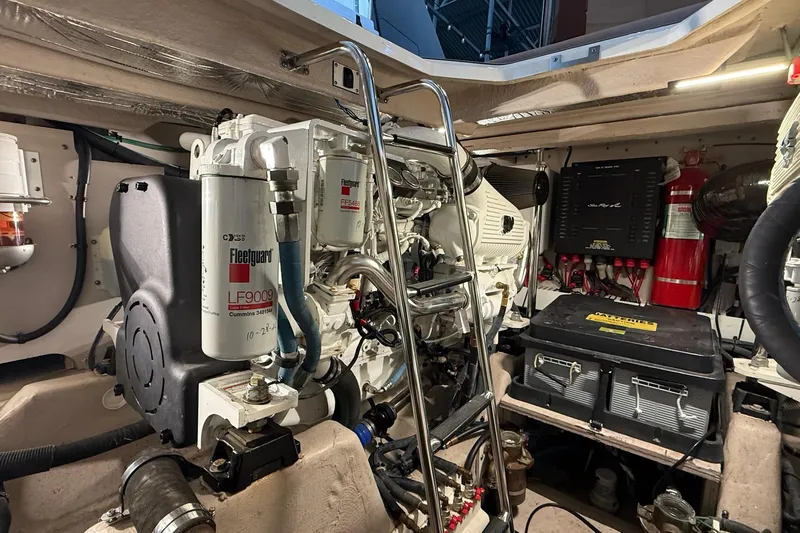  Yacht Photos Pics Engine room of a 2009 Sea Ray 47 Sedan Bridge, featuring mechanical components and equipment.