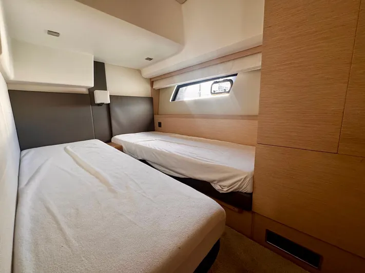 Pure Yacht Photos Pics Twin cabin interior of 2016 Prestige 500 yacht with modern design and natural light.