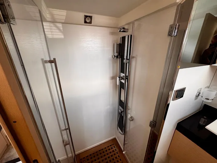 Pure Yacht Photos Pics Modern shower cabin in a 2016 Prestige 500 yacht bathroom.