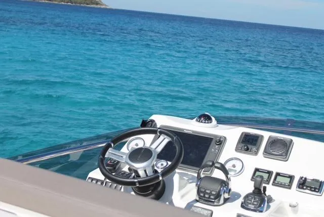 Pure Yacht Photos Pics Helm of 2016 Prestige 500 yacht with ocean view.