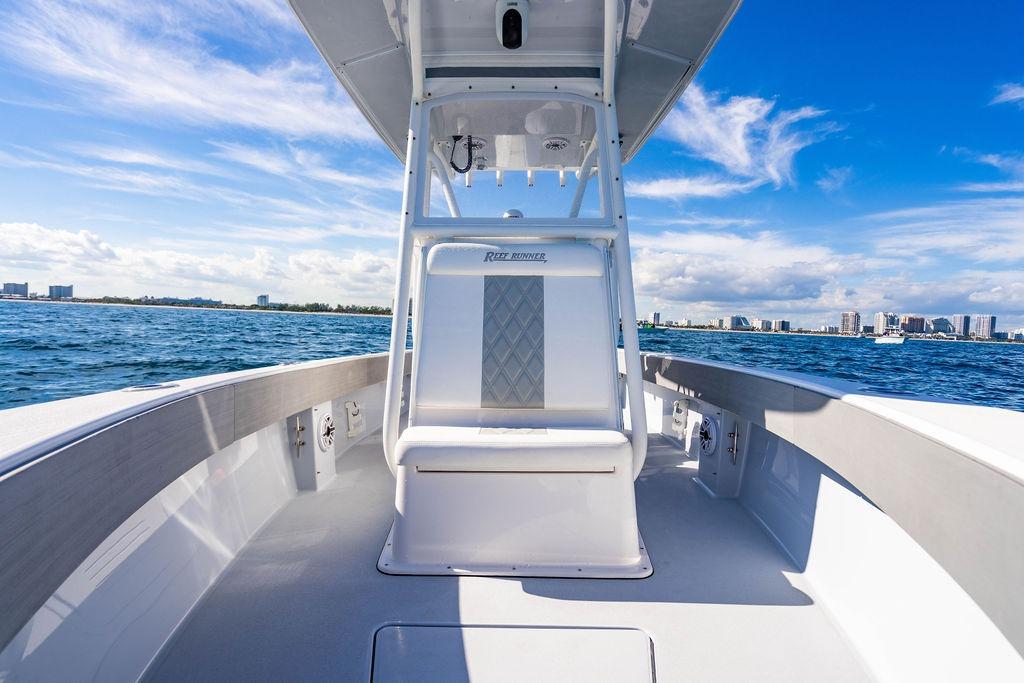 Reef Runner 230 boat on open sea, 2026 model.