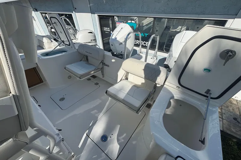  Yacht Photos Pics Interior view of 2026 World Cat 265 CC-X boat, featuring seating and storage compartments.
