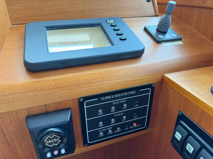 Hezitation Yacht Photos Pics Control panel of 2009 Grand Banks 45 Eastbay SX with navigation and alarm systems.