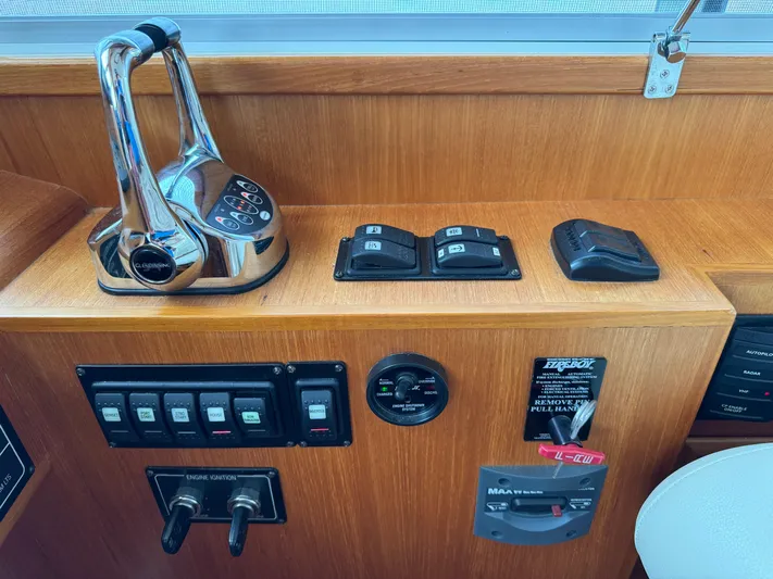 Hezitation Yacht Photos Pics Control panel of 2009 Grand Banks 45 Eastbay SX yacht with throttle and switches.