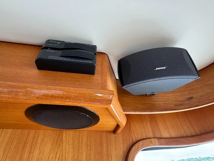 Hezitation Yacht Photos Pics Bose speaker and electronic device on 2009 Grand Banks 45 Eastbay SX wooden interior.