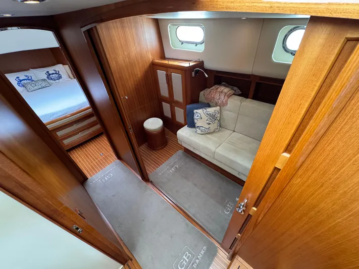 Hezitation Yacht Photos Pics Luxurious 2009 Grand Banks 45 Eastbay SX yacht interior with cozy seating and elegant wood finish.