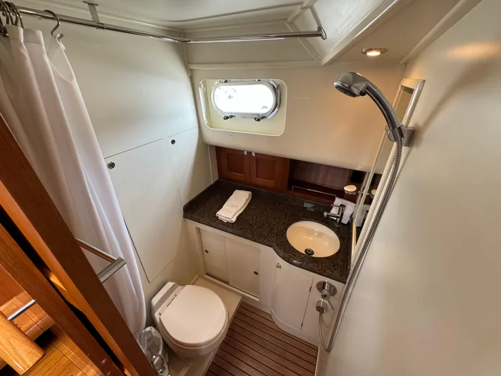 Hezitation Yacht Photos Pics Luxurious bathroom in 2009 Grand Banks 45 Eastbay SX yacht with modern fixtures.