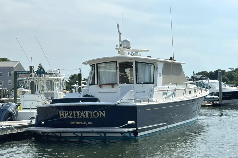 Hezitation Yacht Photos Pics 2009 Grand Banks 45 Eastbay SX yacht docked in Osterville, MA marina.