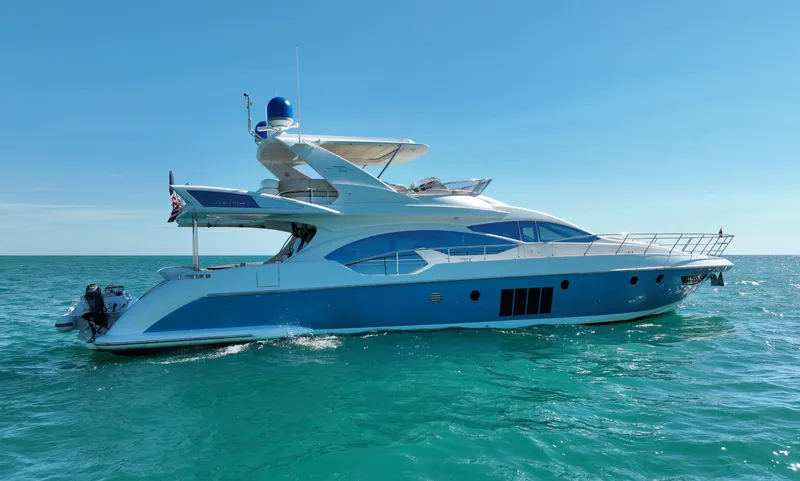 Emma Yacht Photos Pics 2014 Azimut 70 yacht cruising on clear blue ocean waters.