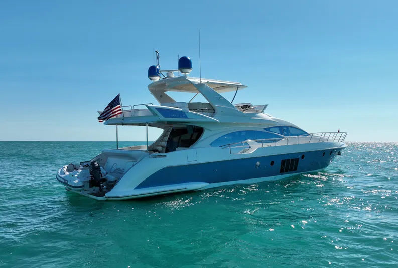 Emma Yacht Photos Pics 2014 Azimut 70 yacht on open water, featuring sleek design and American flag.