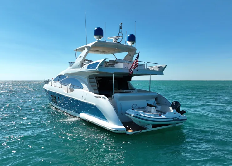 Emma Yacht Photos Pics Luxury 2014 Azimut 70 yacht cruising on clear blue ocean waters.