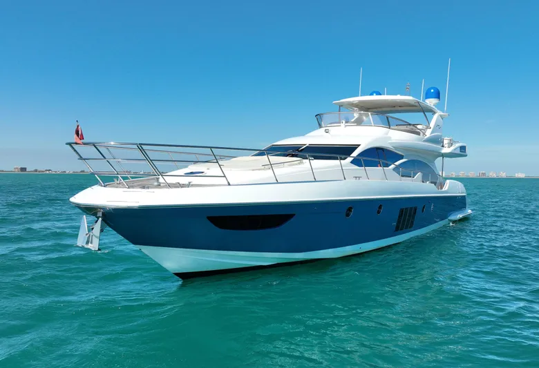 Emma Yacht Photos Pics Luxury 2014 Azimut 70 yacht cruising on clear blue waters.