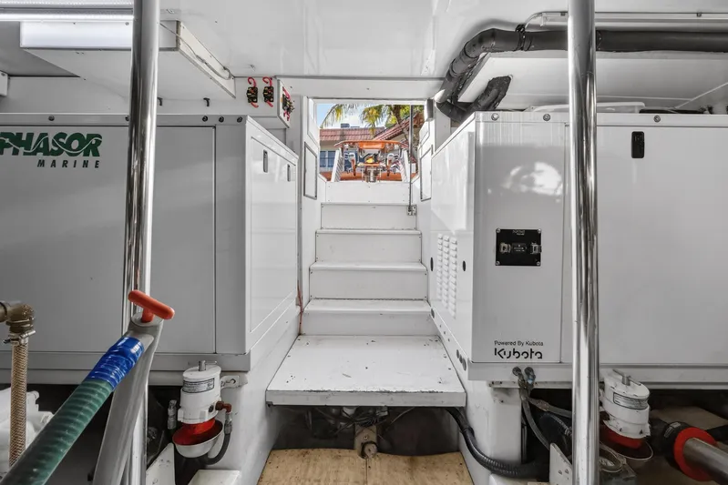 Cherin III Yacht Photos Pics Engine room of 2004 B&D 65 Flybridge yacht with Kubota generator and Phasor Marine equipment.